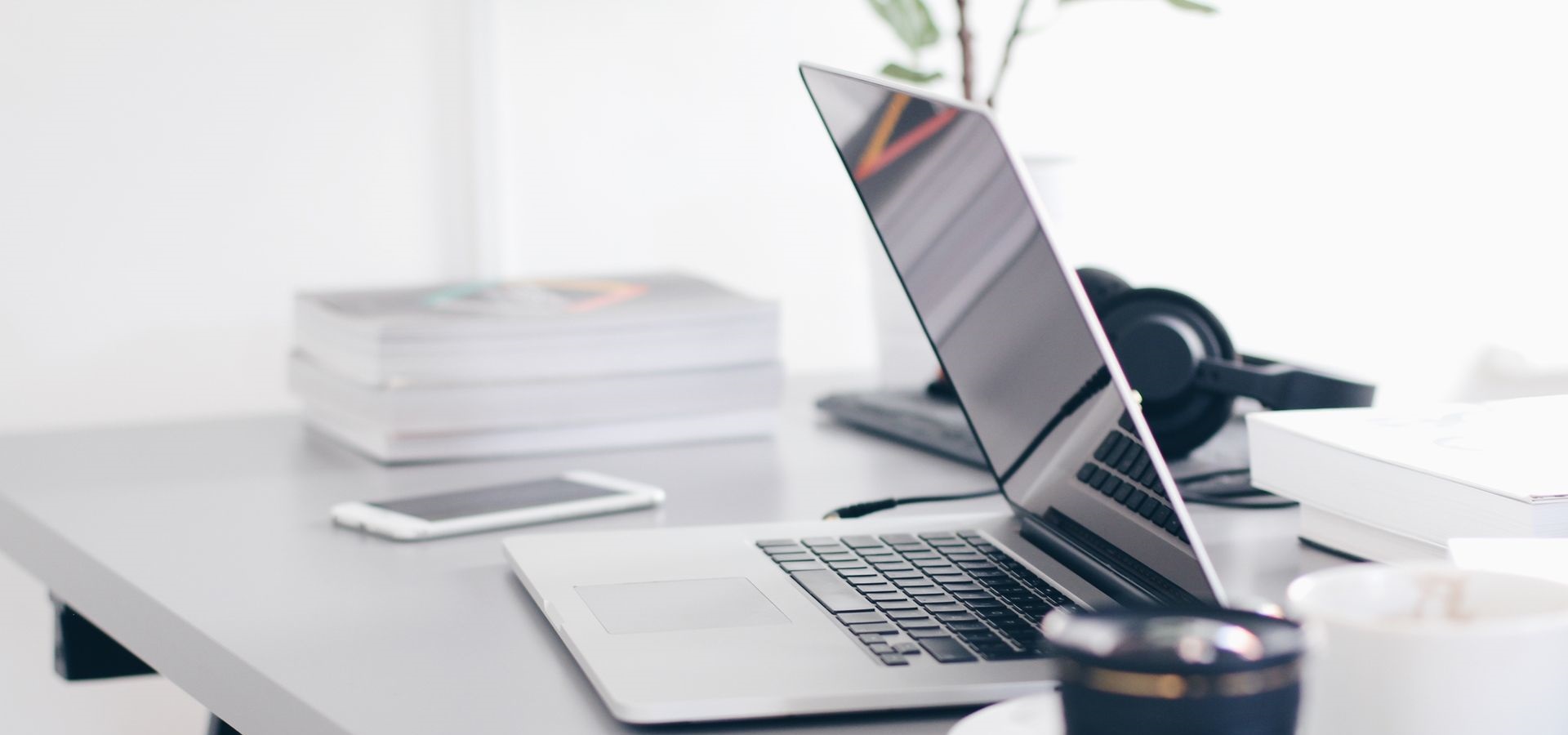 Workspace with computers and notebooks